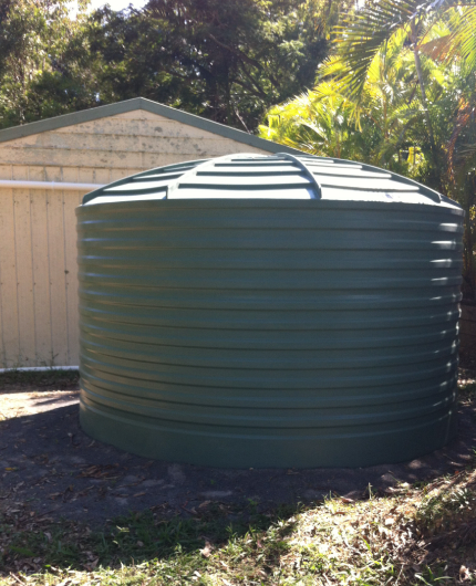 water tank installation next to shed
